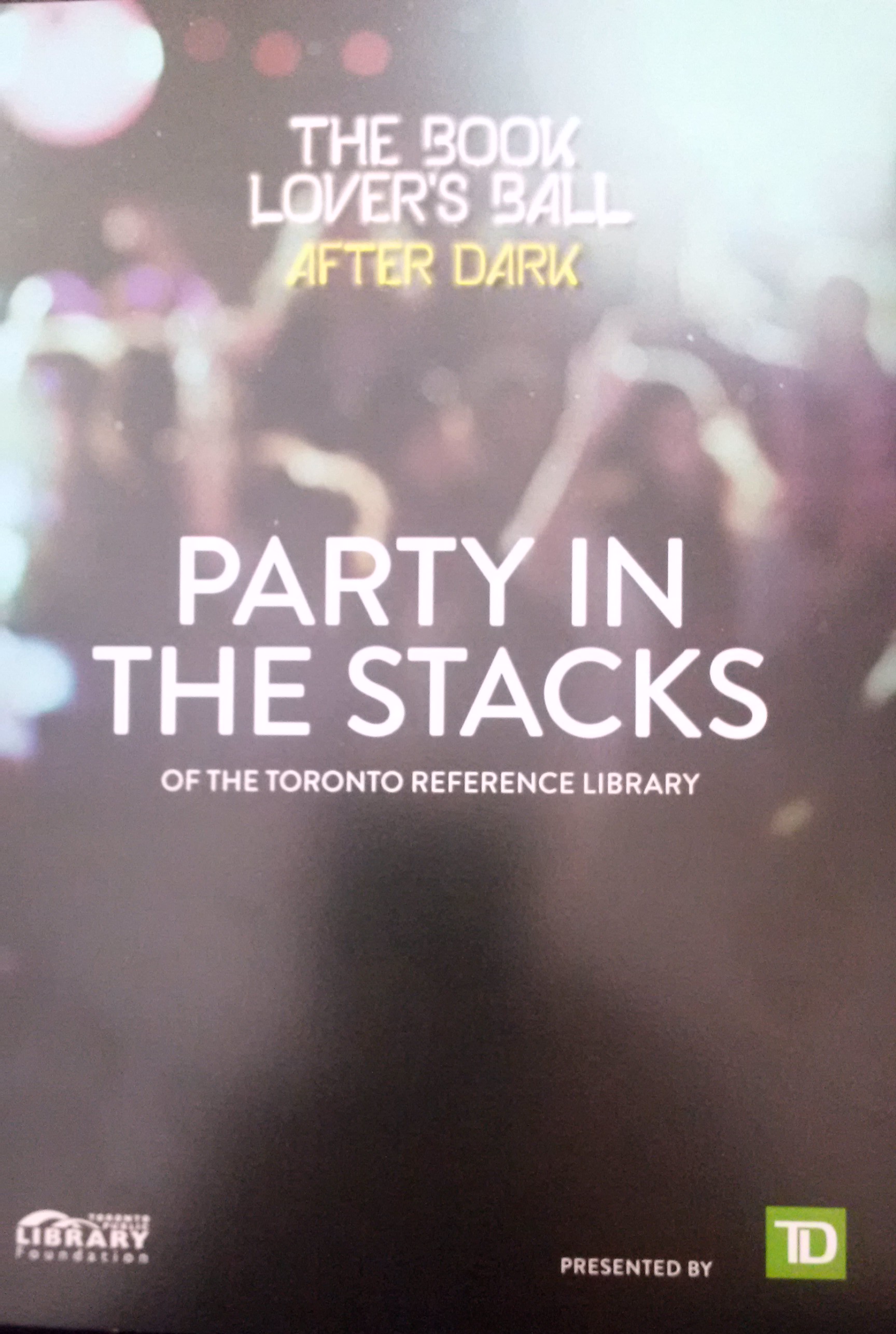 Party in the Stacks, Book Lover's Ball programme - the image is a faded and blurred picture of people dancing where you can't recognize individual people just the shapes