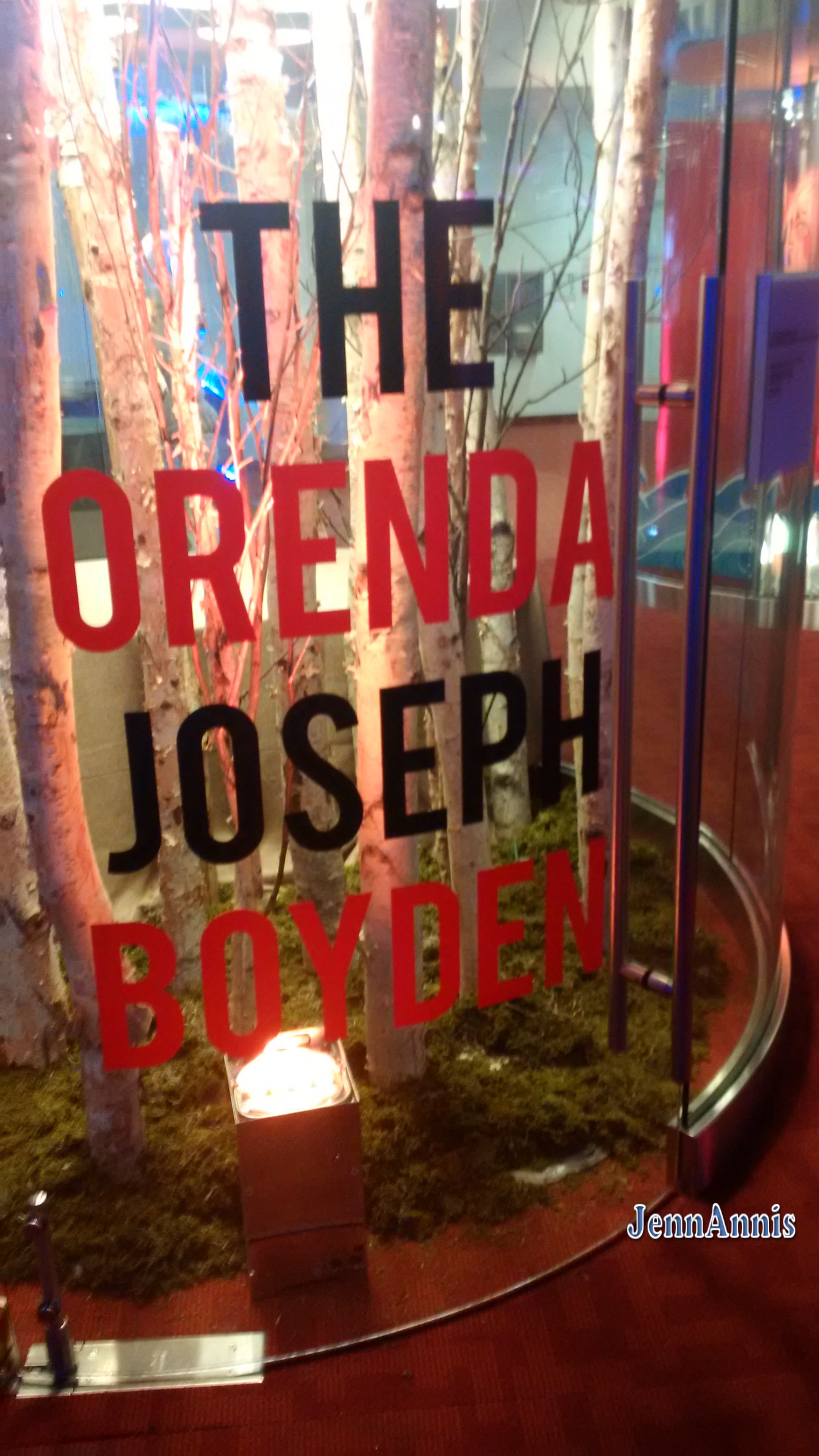 A stand of thin birch trees. Text reading: The Orenda