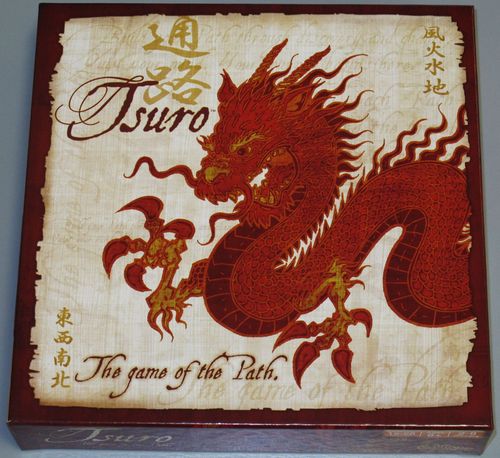 A square board game box with a large dragon on it. Text reads Tsuro The Game of the Path